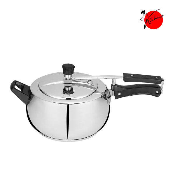 Stainless steel pressure cooker with safety lid and black eronomic handle isolated on white  background .
